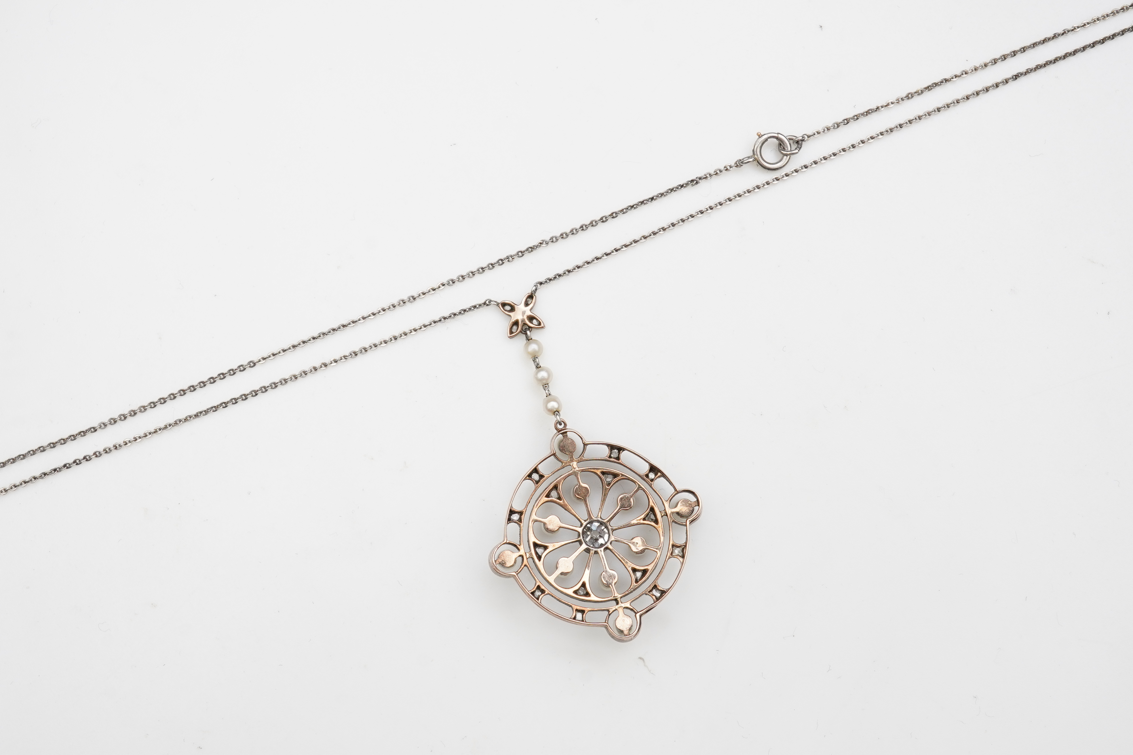 An Edwardian diamond and pearl pendant, early 20th century